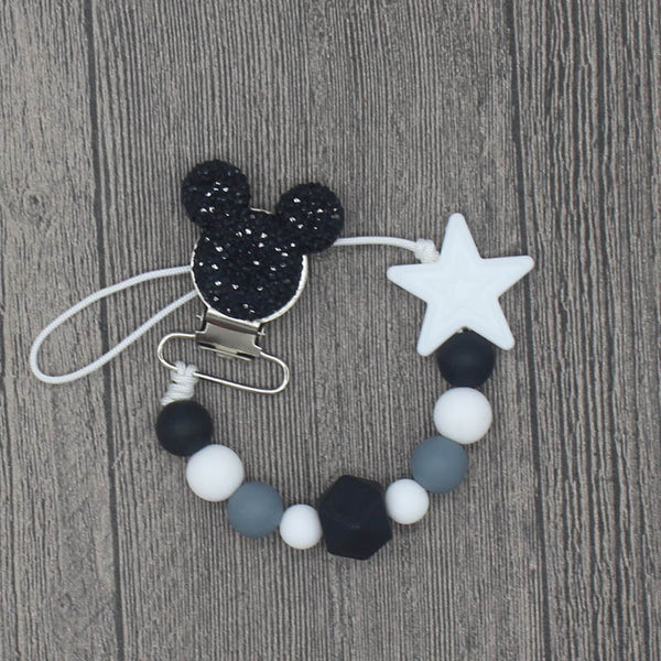 YOU FINALLY FOUND IT! a teething pacifier holder that is trendy, modern and safe for your baby