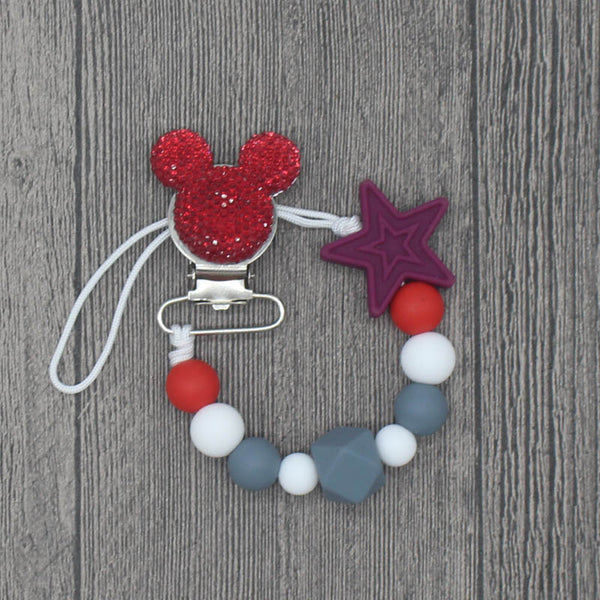 YOU FINALLY FOUND IT! a teething pacifier holder that is trendy, modern and safe for your baby