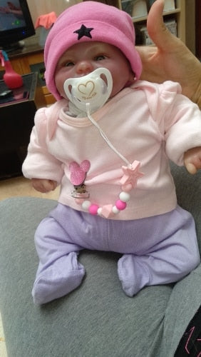 YOU FINALLY FOUND IT! a teething pacifier holder that is trendy, modern and safe for your baby