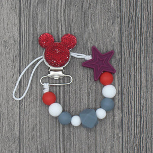 YOU FINALLY FOUND IT! a teething pacifier holder that is trendy, modern and safe for your baby